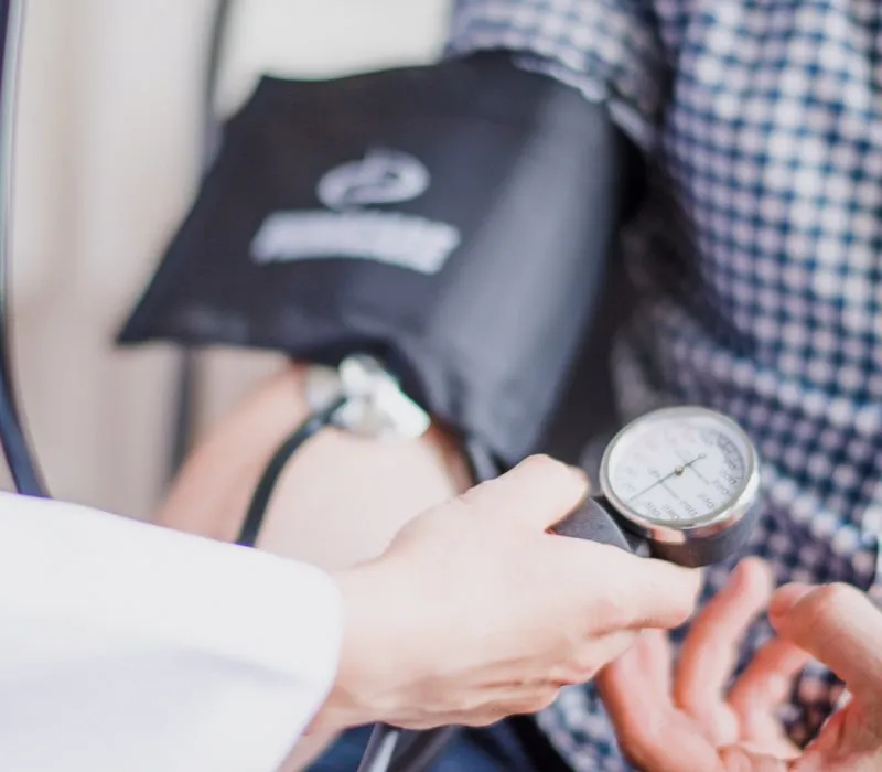 Carer taking blood pressure - Respite Care