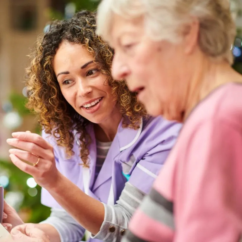 Carer with lady in awe - Supported Living